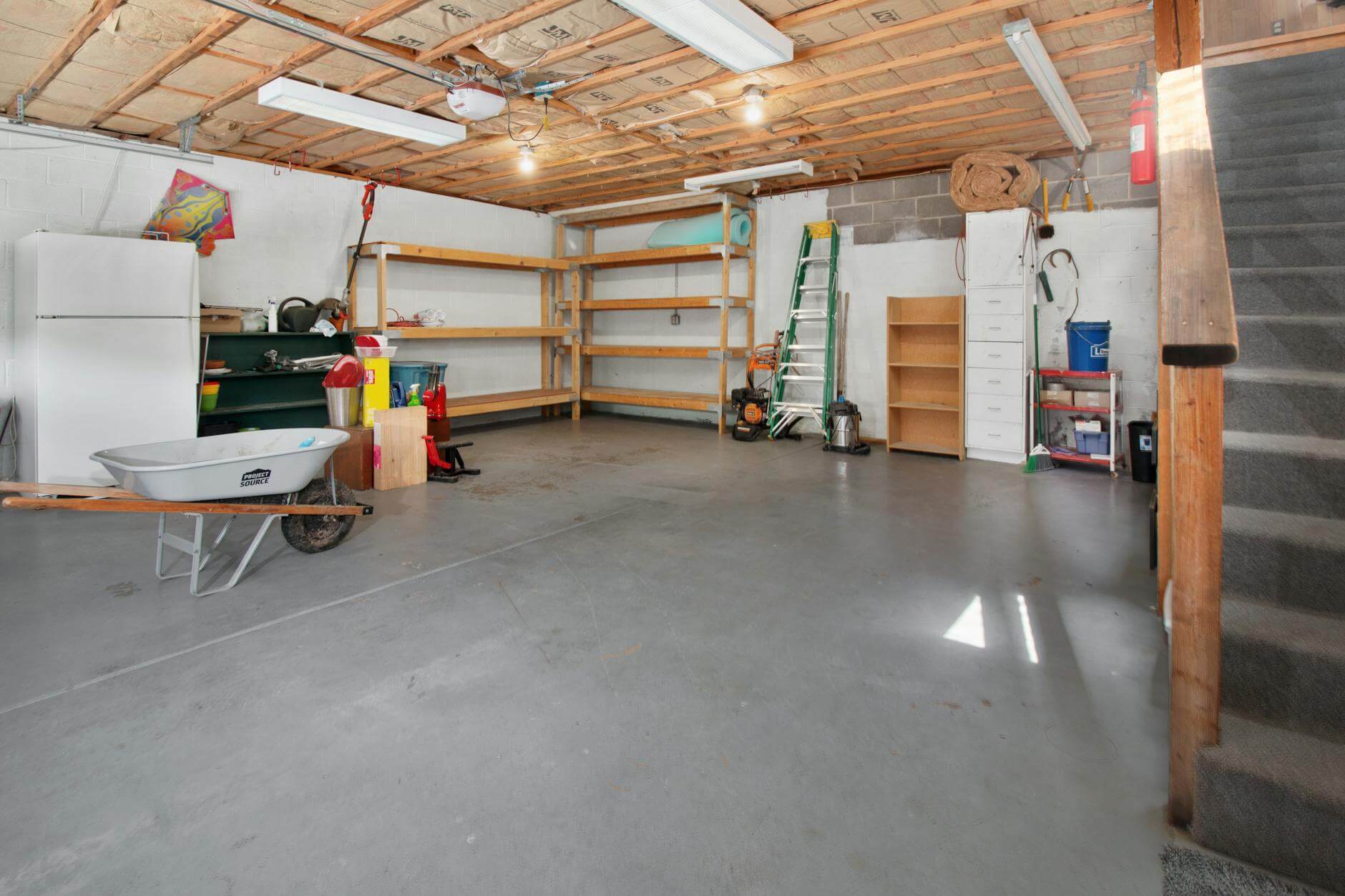 Garage basement attic cleanouts ocean county: a Manchester garage cleared back to the original concrete in a single day