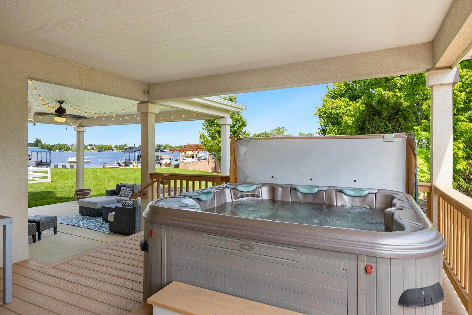 Hot tub removal ocean county nj: an old residential hot tub on a backyard deck before removal